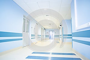 A long light corridor in a modern hospital