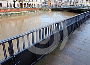 metallic bulkheads to protect Vicenza City in Italy during the flood in winter photo