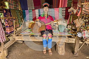 long-necked Karen woman with brass neck rings at Pai in Mae Hong Son, Thailand