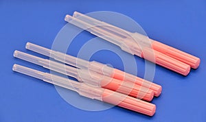 Long Needles used for puncturing artery or vein secured with cap.