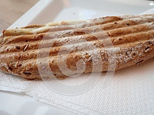 Long panini served on a plate