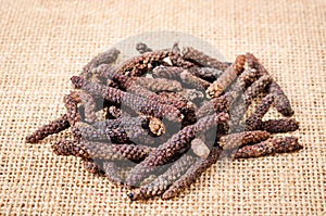 Long pepper or Piper longum.