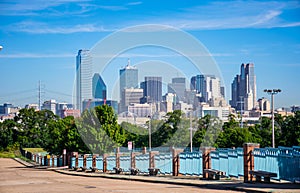 Long Perspective Dallas Texas downtown Metropolis Skyline Cityscape with Highrises and Office buildings on Nice Sunny Day