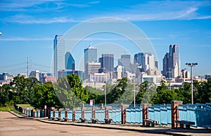 Long Perspective Dallas Texas downtown Metropolis Skyline Cityscape with Highrises and Office buildings on Nice Sunny Day photo