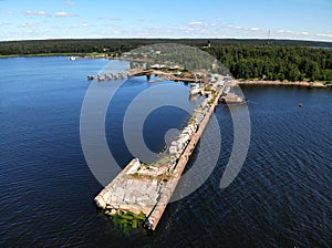 Long Pier breakwater cutwater in lake or sea. Primorsk Koivisto, Russia.
