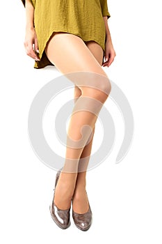 Long pretty woman legs on white background