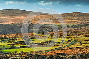 Long road in hills at Dartmoor Park, Devon, UK