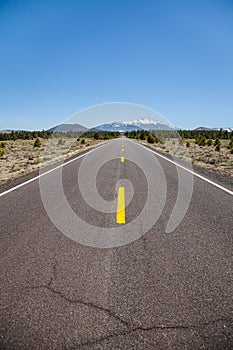 Long road off into the distance towards the mountains