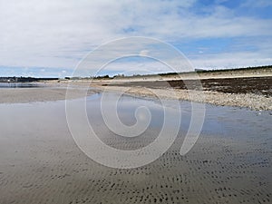 Long Rock beach reflection