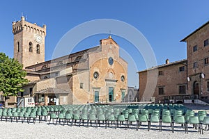 Long rows of empty chairs in Piazza Duomo in the historic center of San Miniato Pisa, Italy, on a sunny day