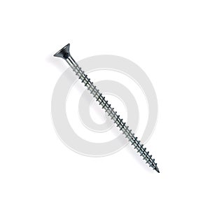 Long self tapping iron screw with flat head, macro close-up isolated on white background.