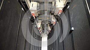 A long series of special cabinets designed for ventilation server on a large industrial plant. Devices connected to a