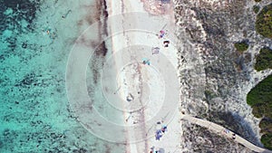 Long shade people swimm, walk on the beach Spectacular aerial view flight drone