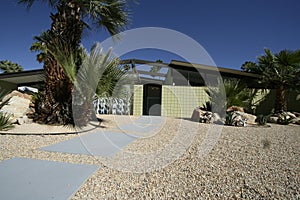 Long Shot Modern Home in Palm Springs with Pitched Roof and Front Patio