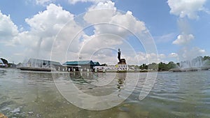 Long shot timelapse movie of Buddha statue at Phutthamonthon