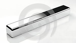Long silver rectangular object on white surface