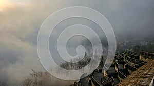 Long staircase ascending under a cloudy sky in Duo Yi Shu, China