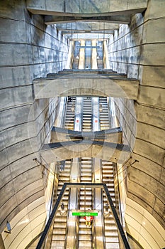 Long staircase and escalator in a modern city subway station in Vienna, Austria