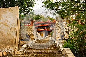 Long stairs to the budhist temple in Vietnam