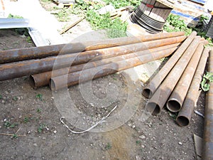 Long steel pipes on the ground