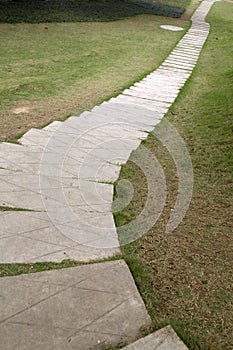 Long stone alley in the park