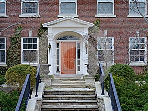 Long stone staircase leading to front door