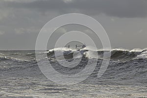 Long stormy breaking wave