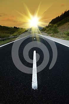 Long road at sunset