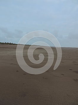 A lungo stirata da dandy Spiaggia sul alba annulla cielo blu turismo Spiaggia vacanza storico 