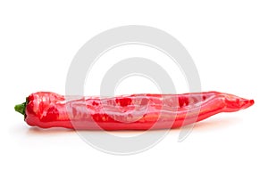 Long sweet red pepper isolated on white