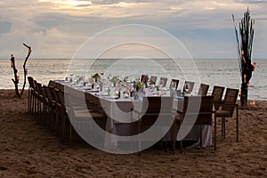 Long table wedding dinner setup.