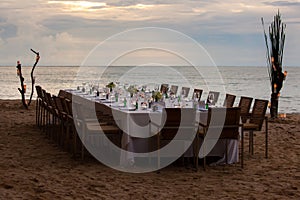 Long table wedding dinner setup.