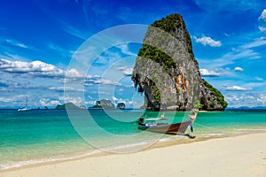 Long tail boat on beach, Thailand