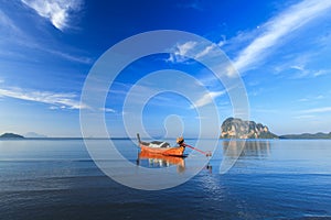 Long tail boat in the blue sea