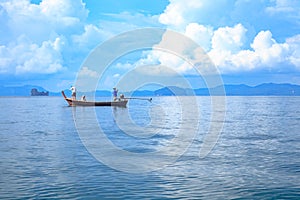 Long tail boat floating on the sea