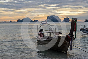 Long tail boat at Sunset at Ko Rang Nok Island in Ao Phra Nang beach, Krabi