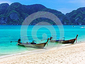 Long-tail boats on a beach of Koh Phi Phi Don, Phi Phi Islands, Thailand