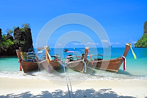 Long tail boats on tropical beach at koh Hong island, Andaman se photo