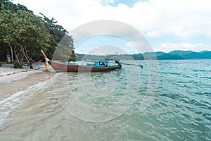 Long-tailed boat in the blue sea go to lipe island