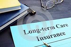 Long term Care Insurance policy on a table.