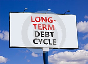 Long-term debt cycle symbol. Concept words Long-term debt cycle on beautiful big white billboard. Beautiful blue sky cloud