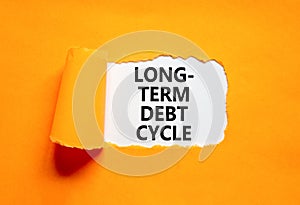 Long-term debt cycle symbol. Concept words Long-term debt cycle on beautiful white paper. Beautiful orange background. Business