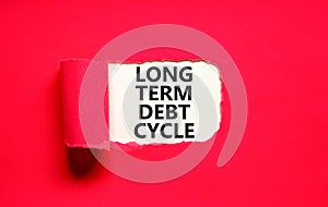 Long term debt cycle symbol. Concept words Long term debt cycle on beautiful white paper. Beautiful red background. Business Long