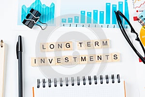 Long term investments concept with letters