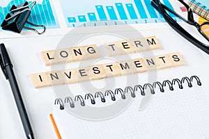 Long term investments concept with letters
