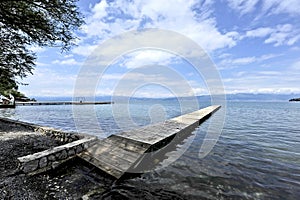 A long and a thin dock in the shore of Lake Ohrid.