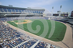 Long view of Baseball diamond and bleachers