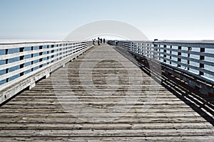 Long View of a Pier with Blue Skies in San Simeon CA