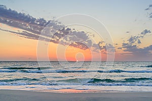 Long wave on the coast, dawn on the sea, Tunisia