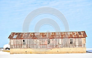 Long Weathered Wooden Barn, Winter